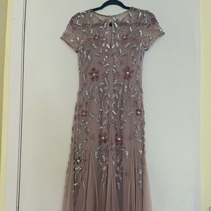 Adrianna Papell light pink embellished gown.